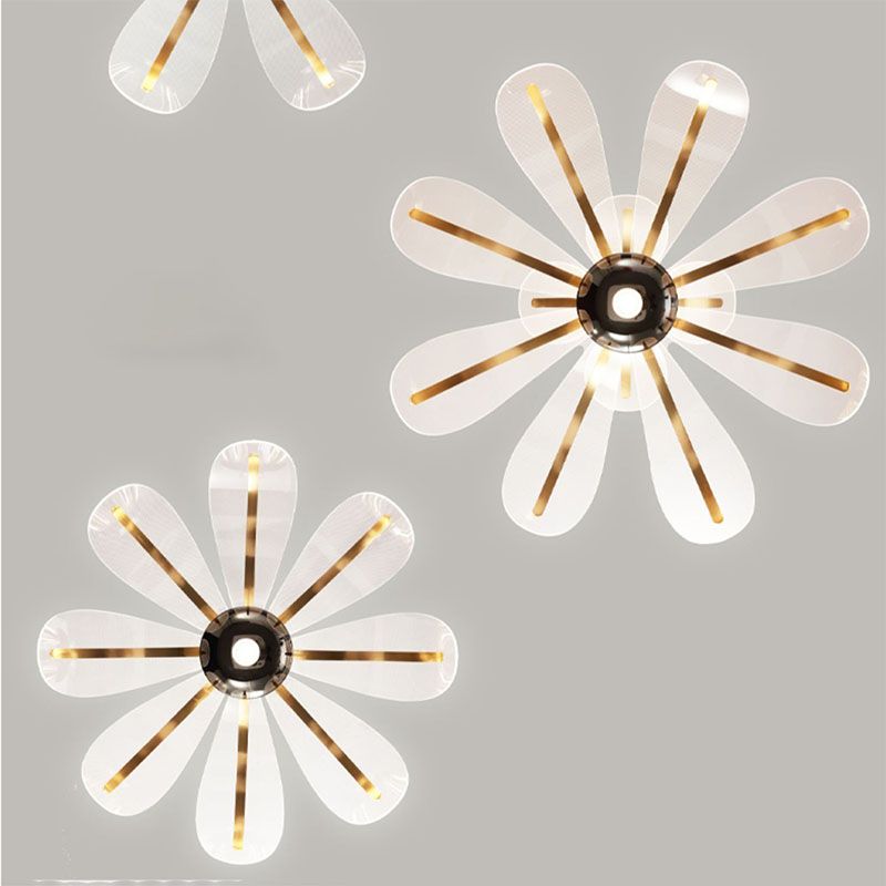 Blossom - acrylic LED pendant light with petal-like translucent shades in brushed gold, three color temperatures, dimmable remote & wall-switch control.