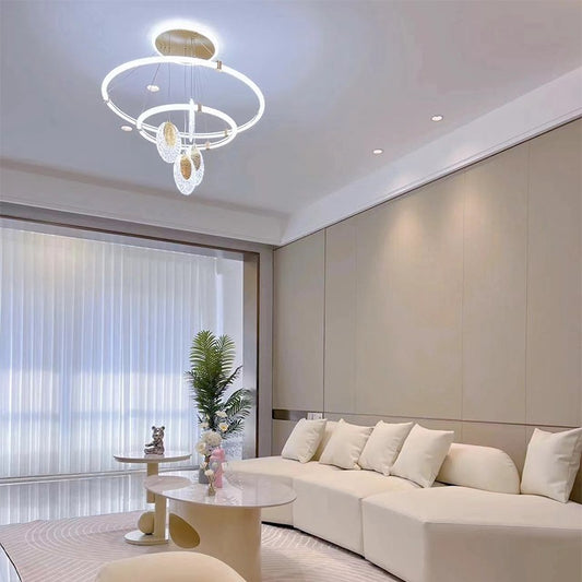 Celestia pendant light with golden aluminum frame and acrylic shades, dimmable with 3 color temperatures, perfect for living rooms, dining areas, and bedrooms.