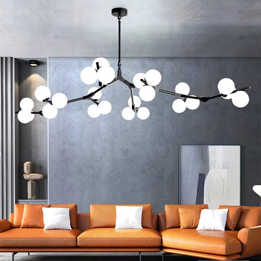 Jusole Lights - Starlume - Modern chandelier with 12, 18, or 24 frosted glass LED heads, black or golden finishes, offering warm or cool light for elegant interior spaces.