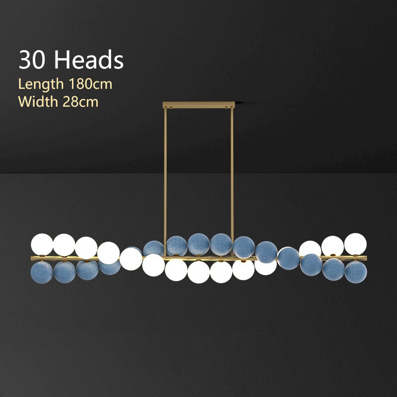 Zephyr Luxury Nordic Chandelier with full brass body and glass globe shades, featuring stepless dimming, suitable for dining room, living room, and designer interiors.