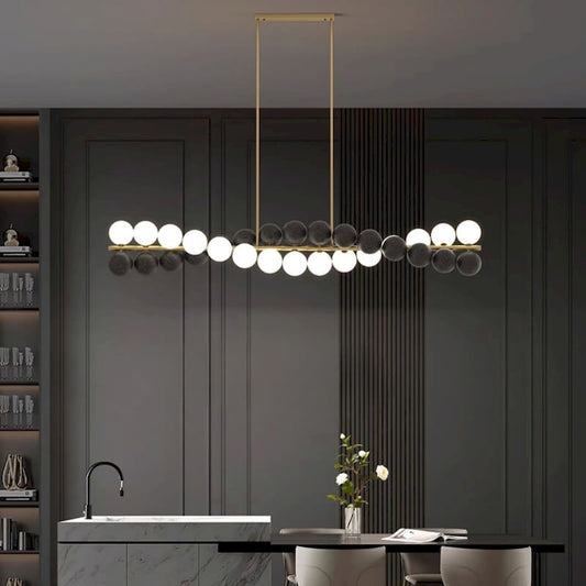 Zephyr Luxury Nordic Chandelier with full brass body and glass globe shades, featuring stepless dimming, suitable for dining room, living room, and designer interiors.