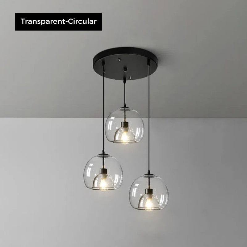 Jusole Lights - Glimmer - three-head pendant light in circular cluster or linear bar style, with gray, amber, or clear glass shades and warm or cool E27 LED illumination.