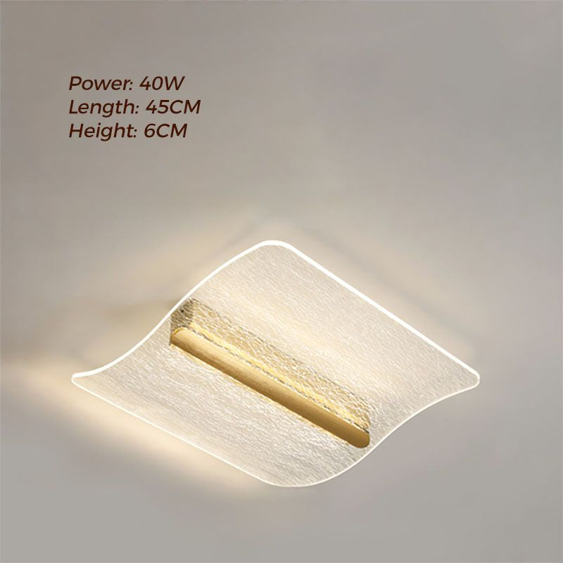 Nimbus cloud-like acrylic LED ceiling light with soft, diffused petals in a minimalist profile, three adjustable color temperatures, dimmable via wall switch or remote.