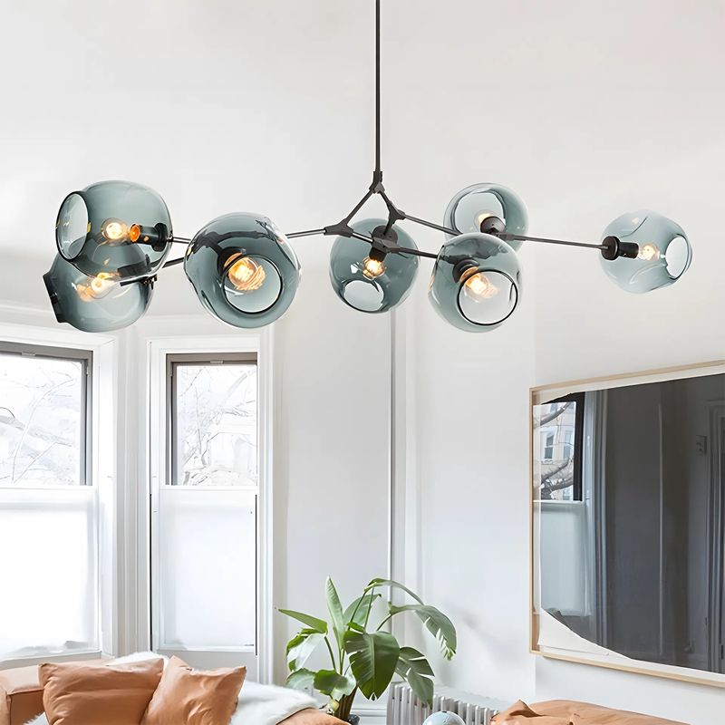 Crafted with a minimalist metal branch structure and available in 6 to 10-head options, Nebula Chandeliers offers flexibility in both style and scale. Perfect for dining rooms, living areas, or bedrooms, it brings a graceful, modern aesthetic to any interior.