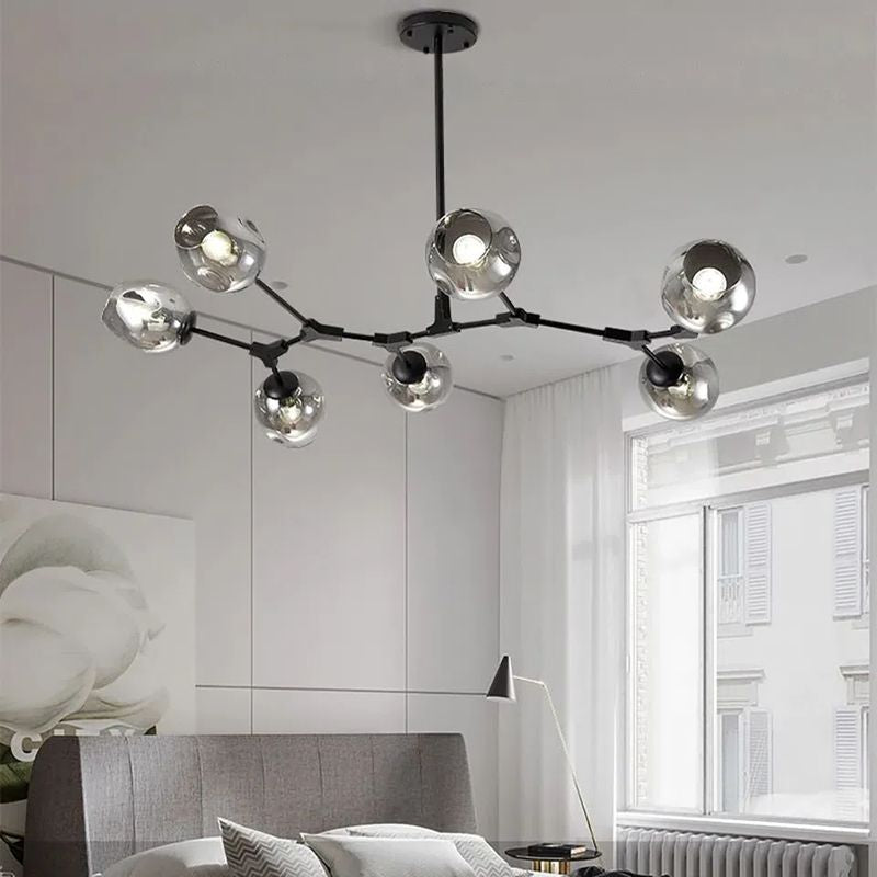 Crafted with a minimalist metal branch structure and available in 6 to 10-head options, Nebula Chandeliers offers flexibility in both style and scale. Perfect for dining rooms, living areas, or bedrooms, it brings a graceful, modern aesthetic to any interior.
