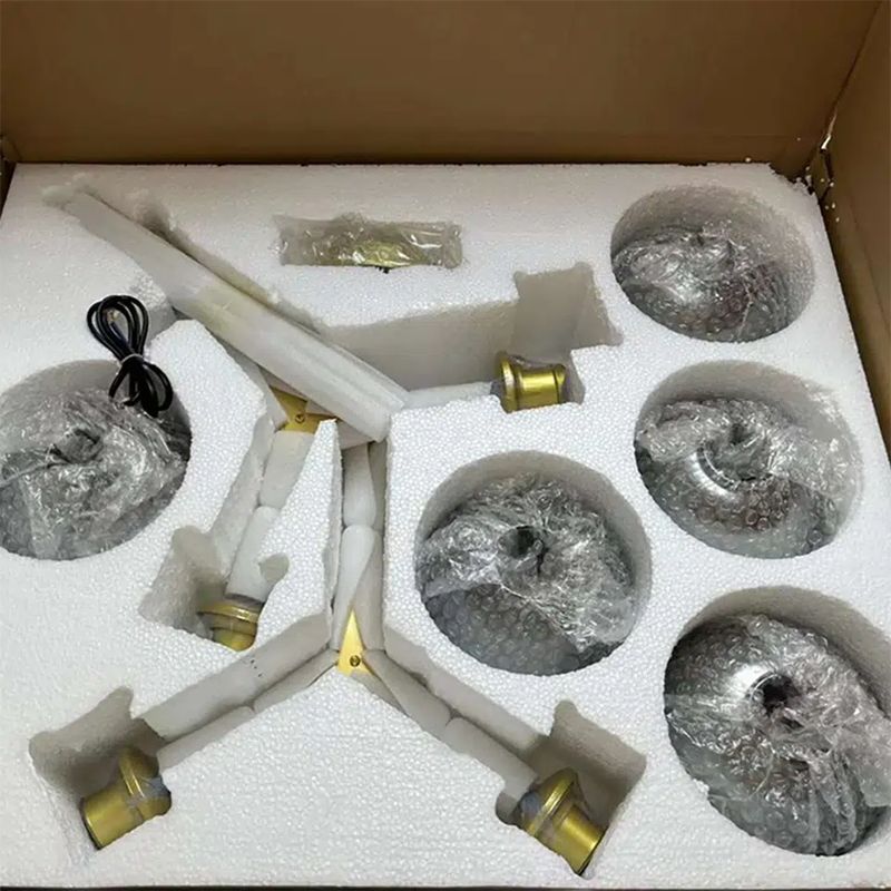 Crafted with a minimalist metal branch structure and available in 6 to 10-head options, Nebula Chandeliers offers flexibility in both style and scale. Perfect for dining rooms, living areas, or bedrooms, it brings a graceful, modern aesthetic to any interior.