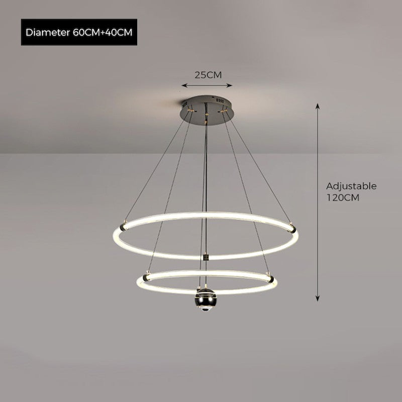 Orbita modern pendant light with acrylic rings, stepless dimming, 3 color temperatures, and 150cm adjustable suspension, ideal for living rooms, dining areas, and creative spaces.