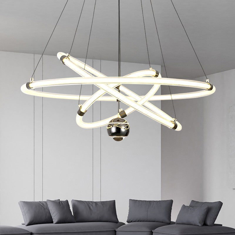 Orbita modern pendant light with acrylic rings, stepless dimming, 3 color temperatures, and 150cm adjustable suspension, ideal for living rooms, dining areas, and creative spaces.