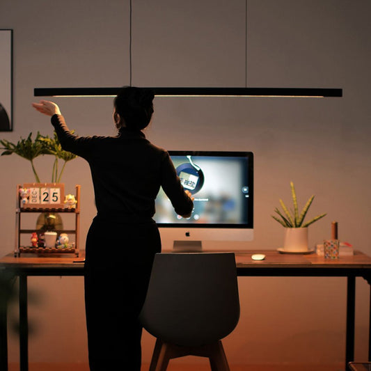 Penumbra - Modern black and white pine wood LED light fixture with versatile control options: hand-sweep sensor, remote control, and wall switch. Adjustable color temperatures - warm light, neutral light, and white light - for customizable ambiance.