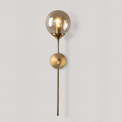Jusole Lights - Torch - Nordic modern LED wall lamp with brass finish and glass globe. Available in smoky gray, transparent, and amber. E14 socket, warm glow for elegant interiors.