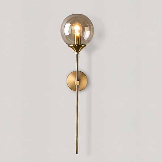 Jusole Lights - Torch - Nordic modern LED wall lamp with brass finish and glass globe. Available in smoky gray, transparent, and amber. E14 socket, warm glow for elegant interiors.