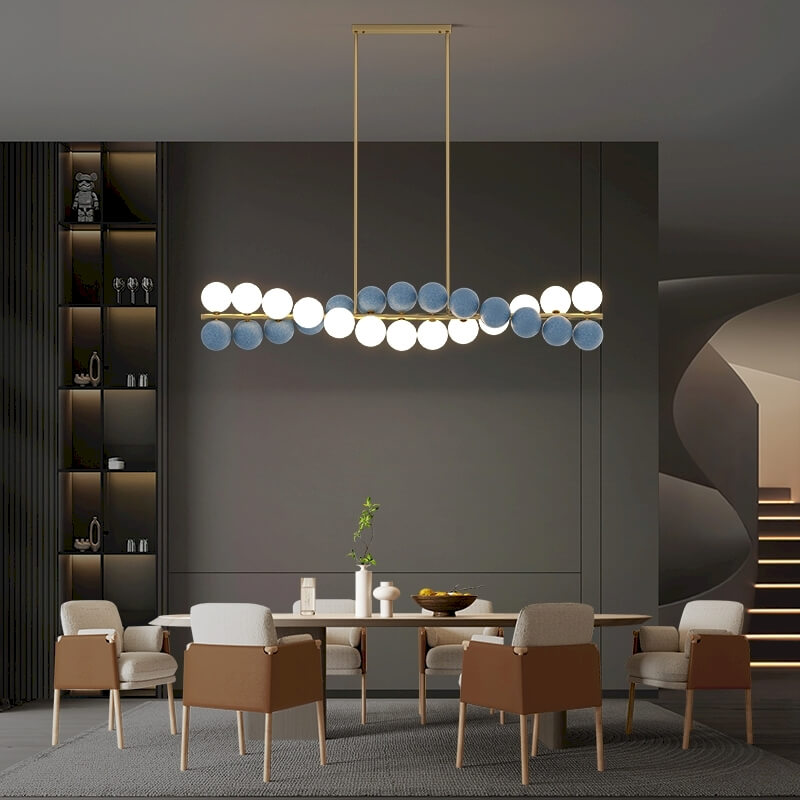 Zephyr Luxury Nordic Chandelier with full brass body and glass globe shades, featuring stepless dimming, suitable for dining room, living room, and designer interiors.