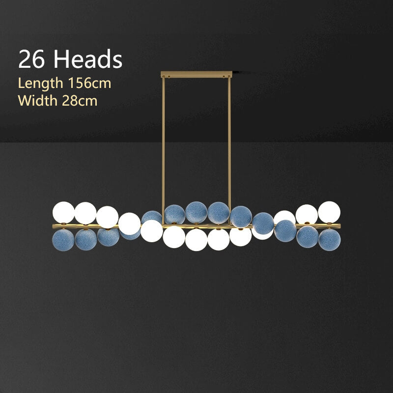 Zephyr Luxury Nordic Chandelier with full brass body and glass globe shades, featuring stepless dimming, suitable for dining room, living room, and designer interiors.