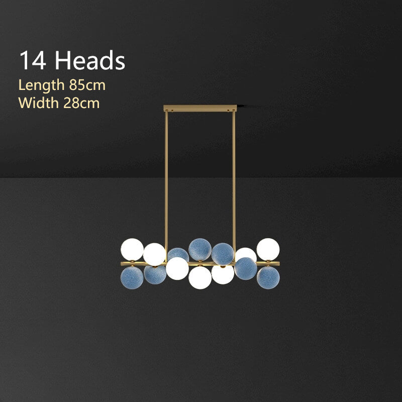 Zephyr Luxury Nordic Chandelier with full brass body and glass globe shades, featuring stepless dimming, suitable for dining room, living room, and designer interiors.