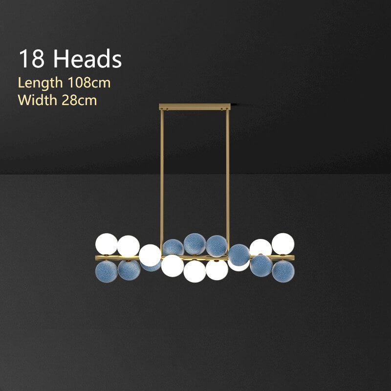 Zephyr Luxury Nordic Chandelier with full brass body and glass globe shades, featuring stepless dimming, suitable for dining room, living room, and designer interiors.